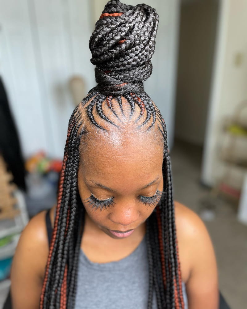 Side-Part Tribal Braids Topknot