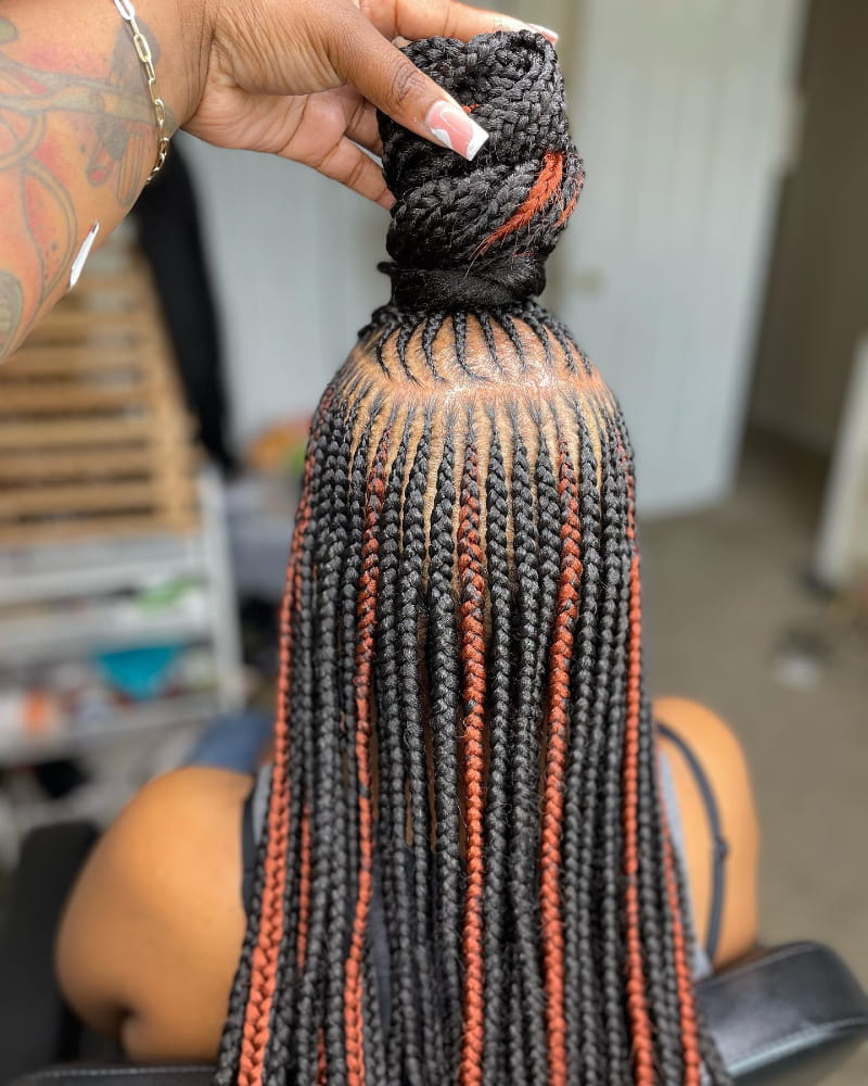 Side-Part Tribal Braids Topknot